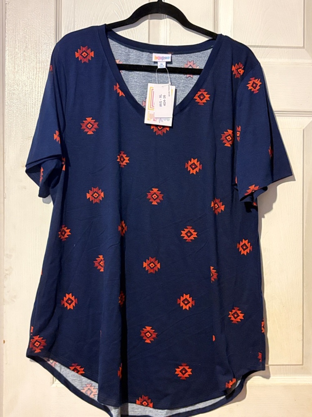 LuLaRoe Navy Short Sleeve V-Neck Top with Geometric Motif